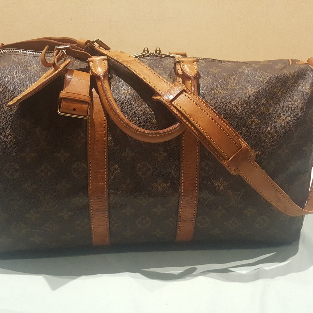 Authentic Louis Vuitton Bandouliere 60